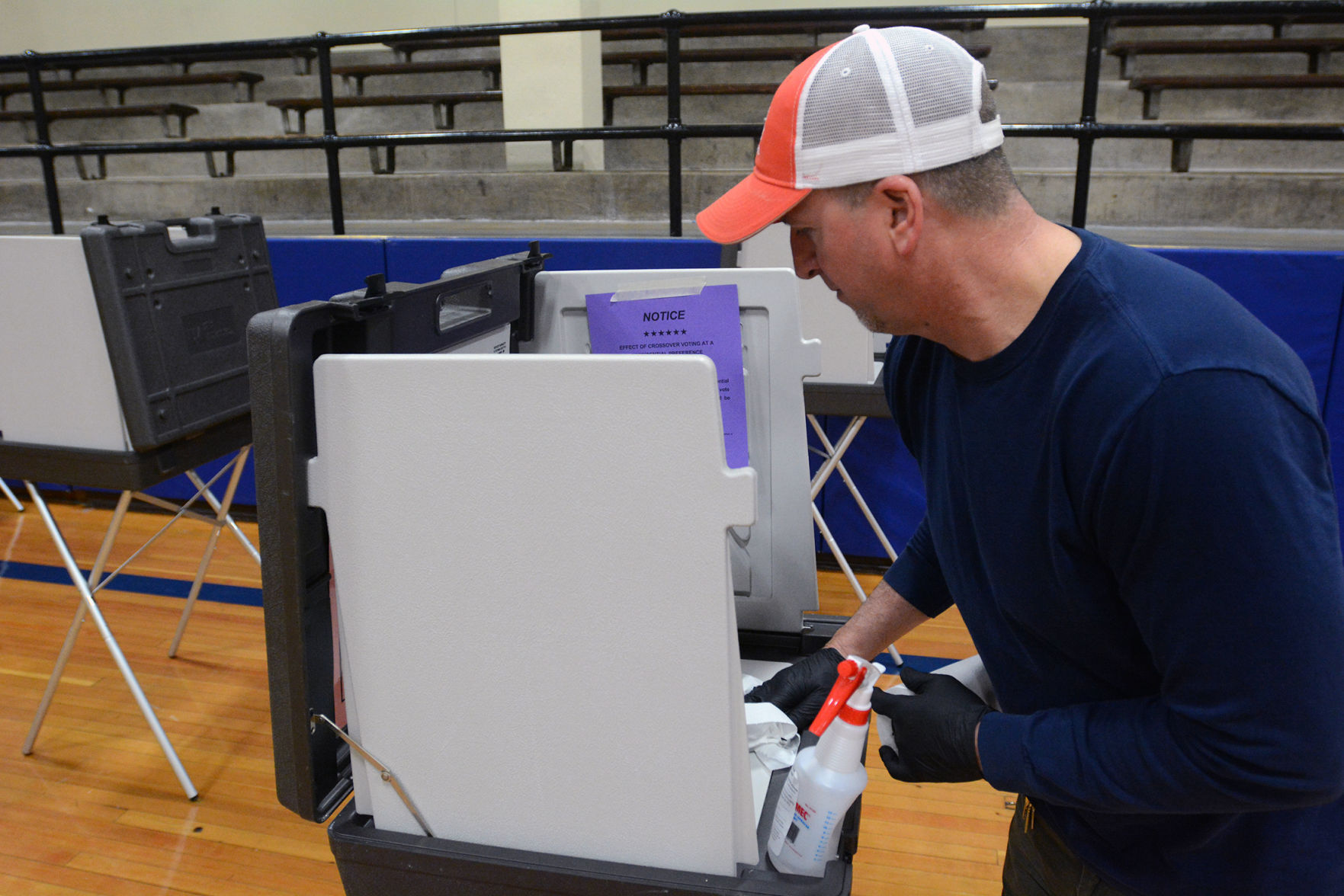 Sanitizing voting booth